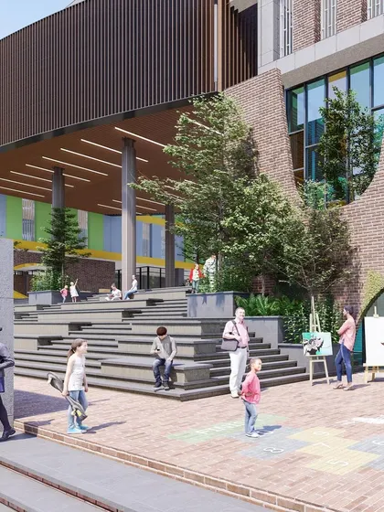 A render of the outdoor creative zone at Basil School. We designed this space with stepped platforms and open areas to encourage various activities, from painting sessions to informal student gatherings.