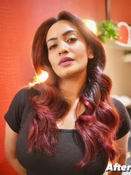 An after shot showing the depth and richness of this red hair transformation. The light hits the layers perfectly, showcasing the different tones we created.