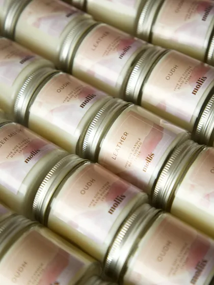 A full view of the custom candles, perfect for sharing the joyous news of a new arrival.