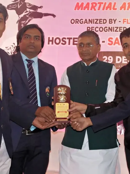 Receiving an award on behalf of my team and association.
