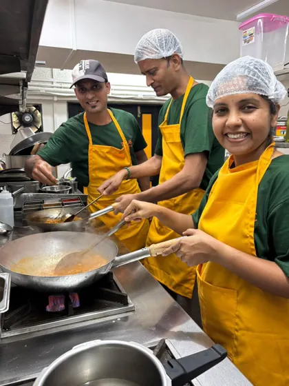 Behind every meal is a team of home-style chefs pouring love into each dish. Their smiles and dedication are the secret ingredients in your tiffin.