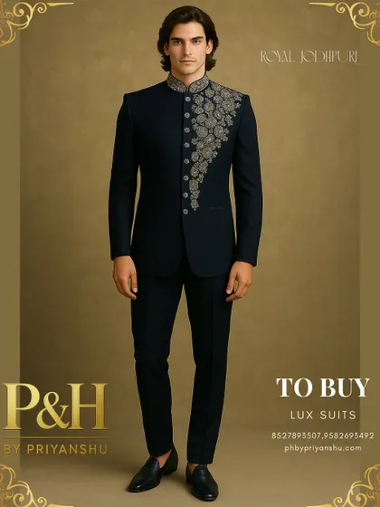 The Jodhpuri suit is a symbol of aristocratic style, and this dark navy blue creation is a testament to that legacy. I have enhanced its classic silhouette with intricate golden floral embroidery that cascades asymmetrically down the front, creating a look of undeniable power and elegance.
