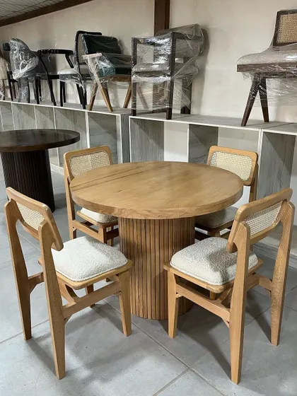 Another view of the fluted base dining table and chairs, a popular design for modern cafes and restaurants.