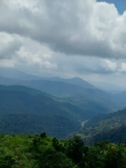 The rolling hills of Devaramane Betta, a beautiful landscape we explore as part of our Didupe and Ermayi falls trek.