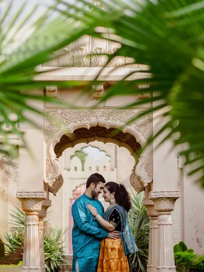 Framed by the timeless beauty of heritage architecture, the couple shares an intimate moment. This pre-wedding shoot highlights how I use stunning locations to create a royal and romantic backdrop for your love story.