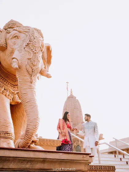 A majestic temple provides a stunning backdrop for this couple's portrait. We specialize in incorporating grand architecture into our destination pre-wedding photography.