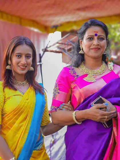 Standing with my mother at the opening event. As a young woman entrepreneur, her guidance and support have been invaluable.