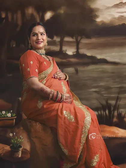 A creative portrait that places the mom-to-be in a painted, classical landscape, turning a photo into a piece of fine art.