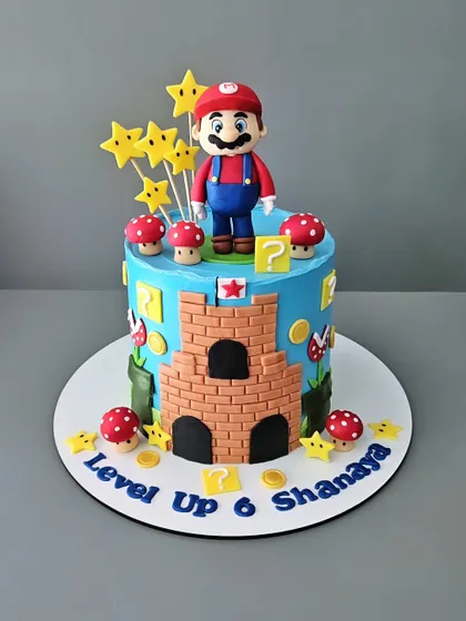 Level up! A Super Mario cake for Shanaya's 6th birthday. This 2.5kg chocolate mousse cake is packed with details from the game, including a hand-sculpted Mario, mushrooms, and question blocks.