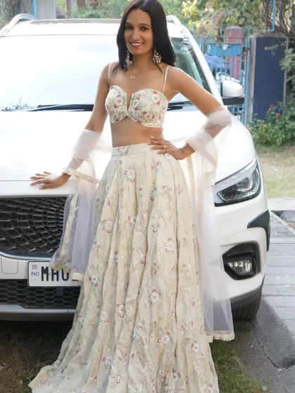 Another shot of our new ivory floral lehenga, perfect for your next event. You can rent or buy our pieces.