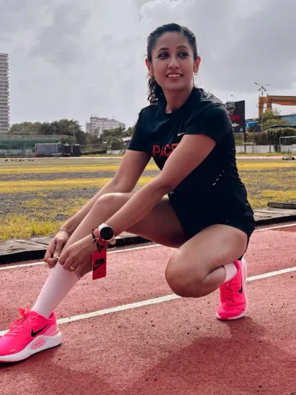 Posing in the Nike Structure 26, a shoe designed for stability and comfort. The right gear, combined with strength training, is your secret weapon for confident, injury-free running.