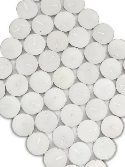 A top-down view of the tealight candles, showing the clean white wax and centered wick, which ensures an even and consistent burn.