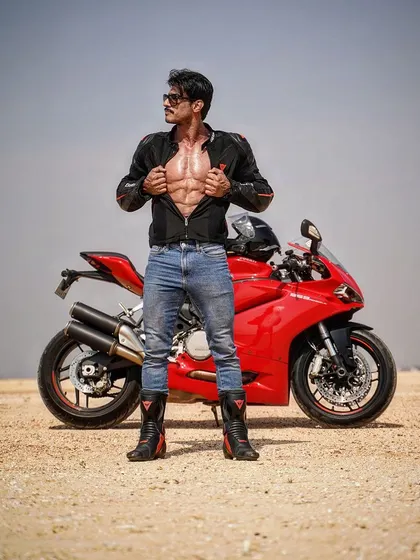 Superman's idea of a day off is going on a long ride. This photo shows how I unwind and recharge, combining my physique with my passion for bikes.