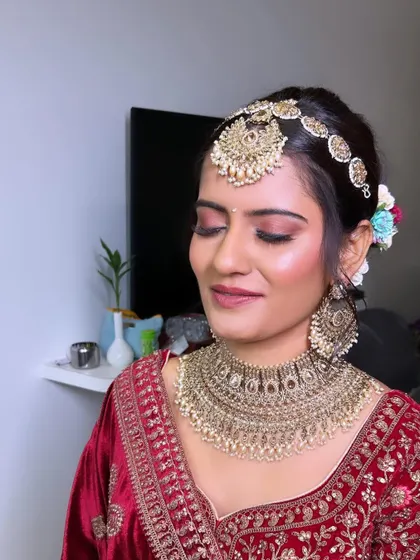 A close-up of a traditional Phera look. I focused on creating a beautiful smokey eye with a touch of shimmer, paired with a matte base to ensure the bride looked perfect for her main ceremony.