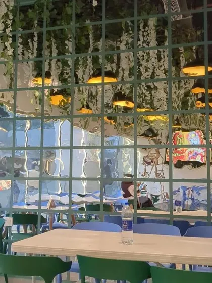 A glimpse of the unique mirror wall at our Spectrum Mall outlet, which adds a creative touch to the ambiance.