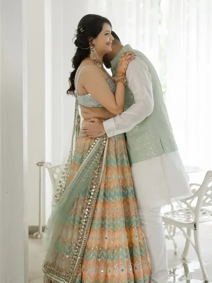 A quiet embrace. Even in a simple setting, the connection between the couple creates a powerful and intimate portrait.