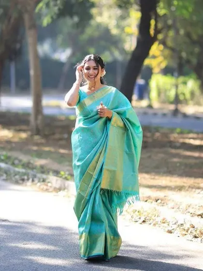 A moment of pure grace. For this bride's pooja ceremony, we created a subtle and radiant look paired with an elegant, traditional saree draping that was both beautiful and comfortable.
