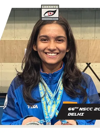 Isha Taksale smiling with her gold medal after setting a new National Record at the 66th NSCC in Delhi.