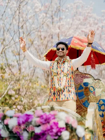 A spectacular groom's entry on a decorated chariot, under a beautiful canopy of blooming trees. We plan entries that are as unique as our couples.