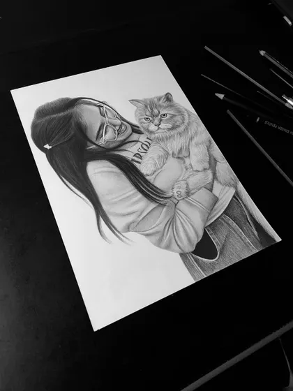 A special request from Gujarat to draw a portrait with a cute cat. I loved capturing the bond between them in this A4 graphite pencil sketch.