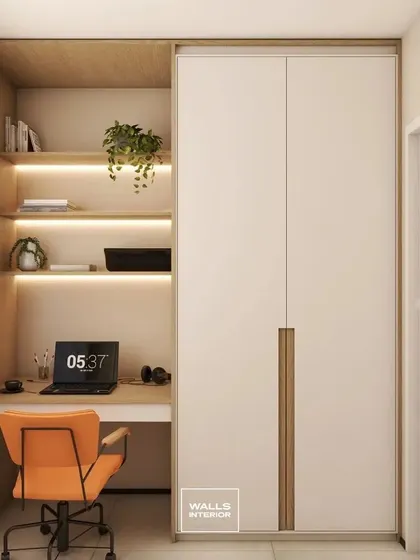 A perfect solution for a small bedroom, this unit combines a wardrobe with an integrated study nook. The backlit open shelves provide storage for books and files, while the desk is perfectly sized for a laptop.
