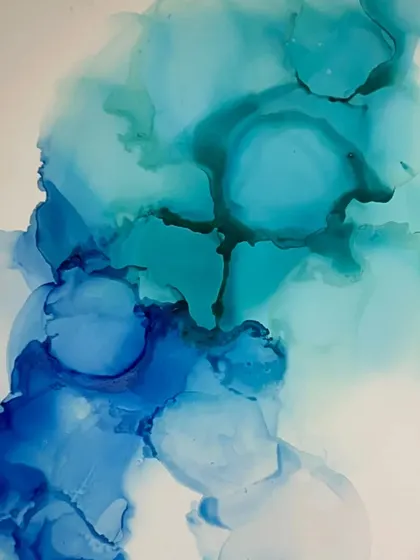An example of the "faded wisps" technique with alcohol inks, creating a soft, ethereal look. This is one of the many styles you can learn with me.