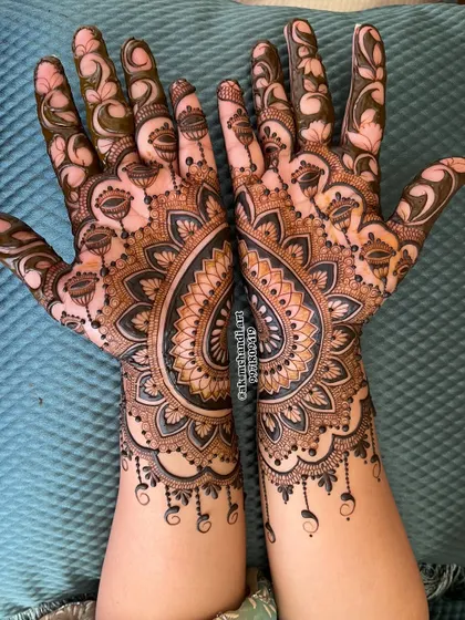 A stunning heart-shaped bridal design, where both hands come together to form a complete heart. This is a very popular and romantic choice for brides.