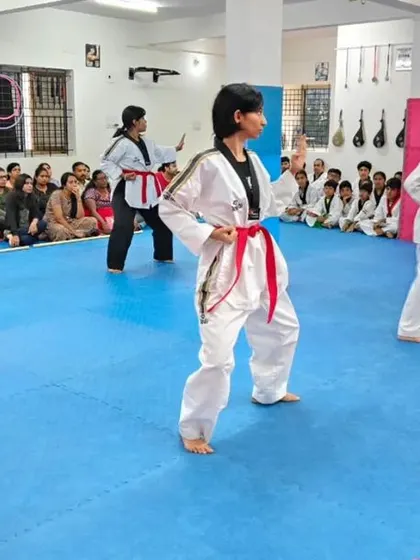 Students practicing their forms during a belt exam.