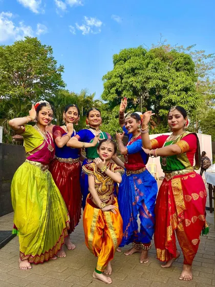 My girls and I enjoying the sunny weather and the success of our performance. These are the moments that build our bond as a dance family.