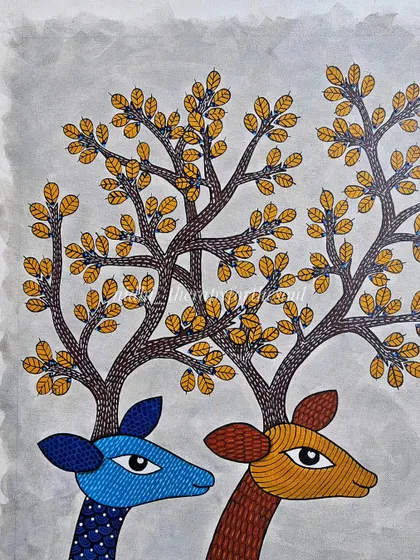 A close-up of the two deer heads and the tree branches that form their antlers. This highlights the delicate leaf patterns and the gentle expressions of the animals in this Gond artwork.