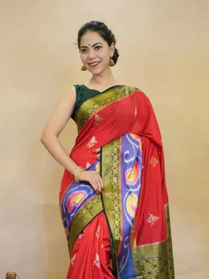 This vibrant red and blue Patola silk saree is a celebration of color and craft. As a 1-Minute Saree, it allows you to wear this traditional masterpiece with complete ease.