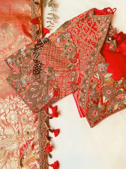 An intricately embroidered blouse where each thread tells a captivating story.