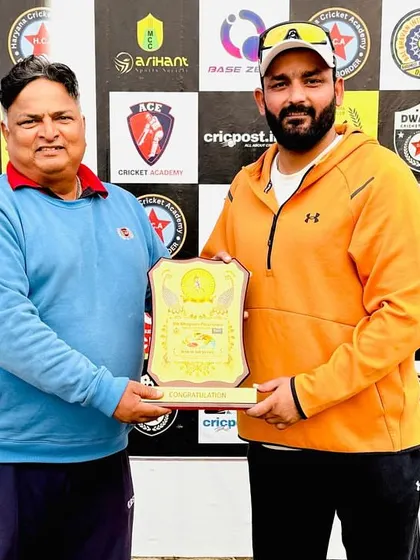 Receiving a memento at the 9th Bhagwan Parshuram Open Cricket Tournament.