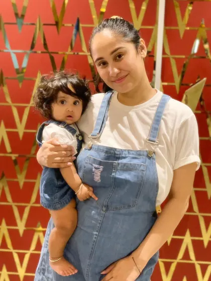 Twinning with my daughter in denim overalls. Love creating these matching moments with her.