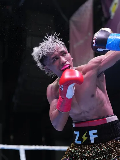 The moment of impact. Zoramchanna connects with a clean shot, a testament to his precision and timing.