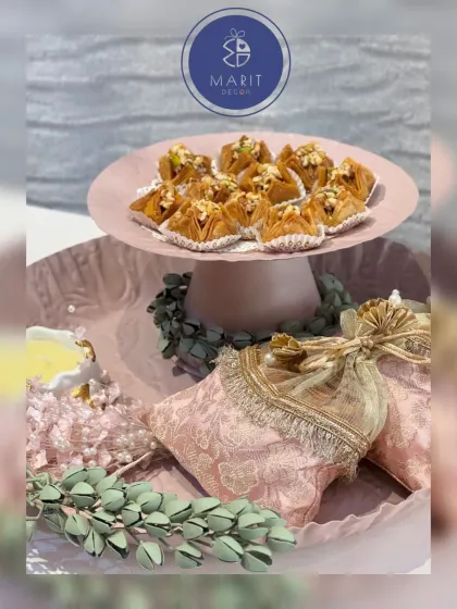 Another angle of my Ghibli-inspired sweet and dry fruit platter. The combination of the textured metal tray, 'potlis', and sweets creates a dreamy, artistic presentation.