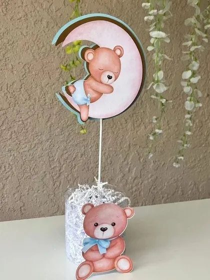 We also create smaller decorative pieces like this cute teddy bear centerpiece with a sleeping bear on a moon cutout.