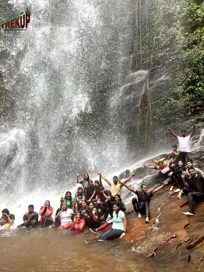 Our group having a blast on the slippery rocks of a waterfall. It is all about making memories and having fun together.