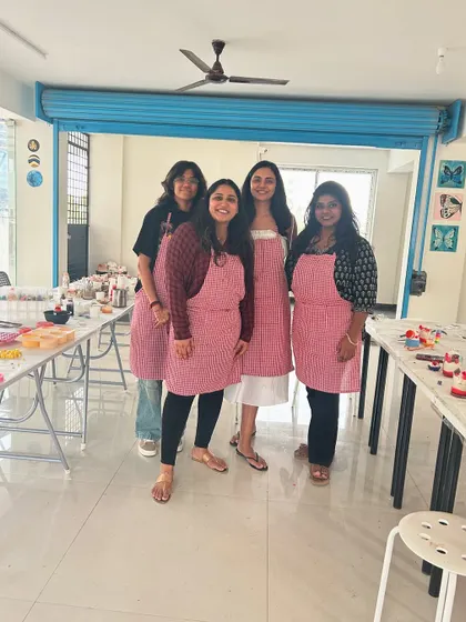 Another happy group poses in our studio, showcasing the fun and social aspect of our workshops.