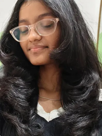 All about the haircut. This young client looks great with her new long layers and soft waves.