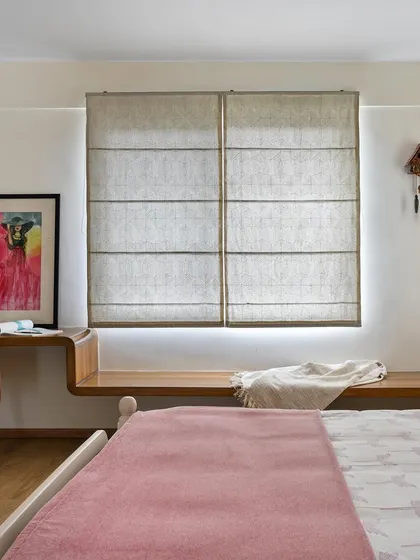The study desk in the 'House of Kismish' bedroom flows into a long window seat, creating a functional and beautiful feature that makes the most of the space and natural light.