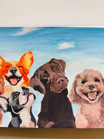 A close-up on the group dog portrait, highlighting the chocolate lab's curious head tilt and the poodle's big smile.