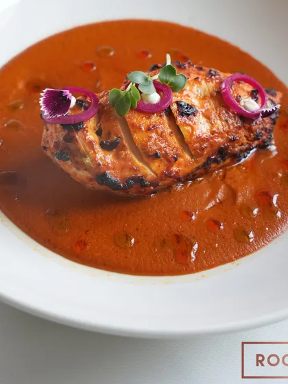 The Stuffed Chicken Breast with Chettinad curry, a dish that brings together flavours from the south of India with a modern plating style. The curry is rich, spicy, and aromatic.