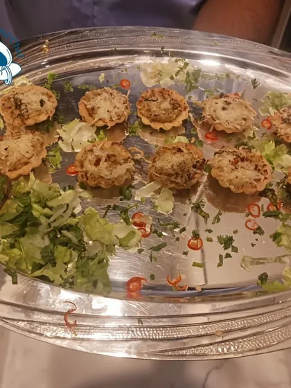 A tray of mini tarts, showcasing the variety of appetizers we can offer.