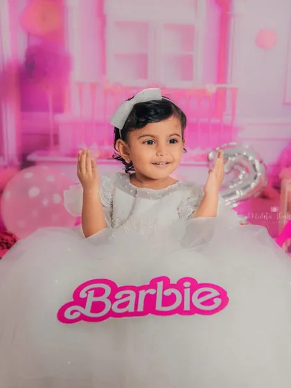 A true Barbie girl in a Barbie world. This little princess is celebrating her second birthday in style.