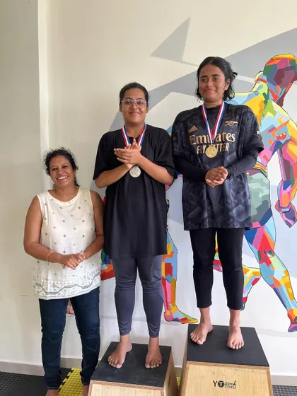 Our female competitors on the podium. Their performance was outstanding, and we are proud of their achievements in our in-house tournament.