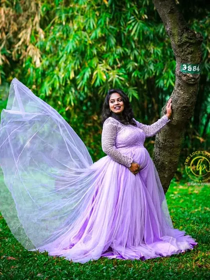 For this serene maternity photoshoot, I provided a flowing lavender gown and styled the mother-to-be with soft, glowing makeup and gentle waves in her hair to create this beautiful, ethereal look.