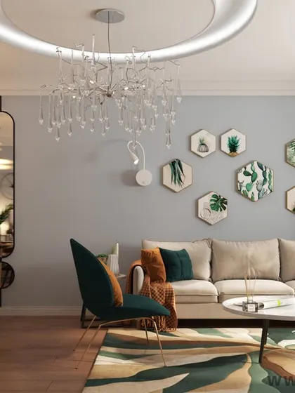 Here, we blended mid-century and rustic styles to create a unique living area. The design features a mix of natural textures, earthy tones, and modern furniture, with a statement chandelier and hexagonal wall art adding a contemporary touch.