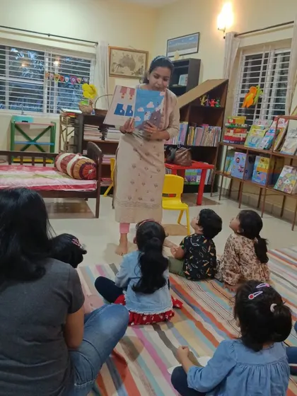 A duplicate shot capturing the children's engagement during the story of Josephine's magic shoes.