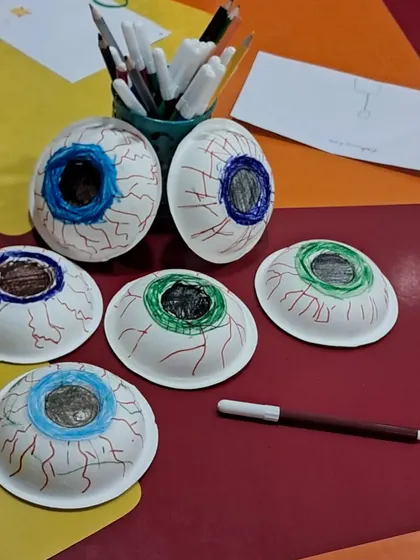 The amazing results of our "All About Eyes" craft session. The children created their own models of the human eye using paper plates and markers.